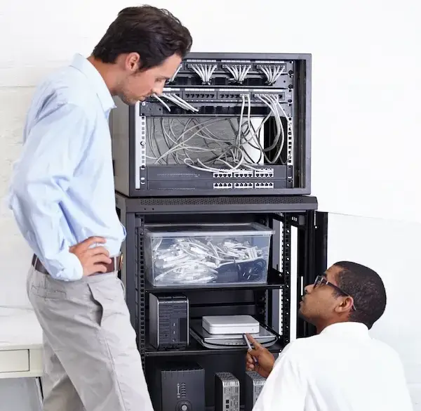 https://kraftbusiness.com/wp-content/uploads/2024/09/it-technician-server-rack-1.webp